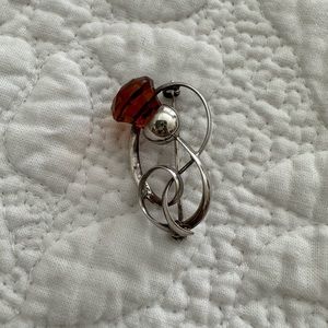 Sterling pin with a clover motif